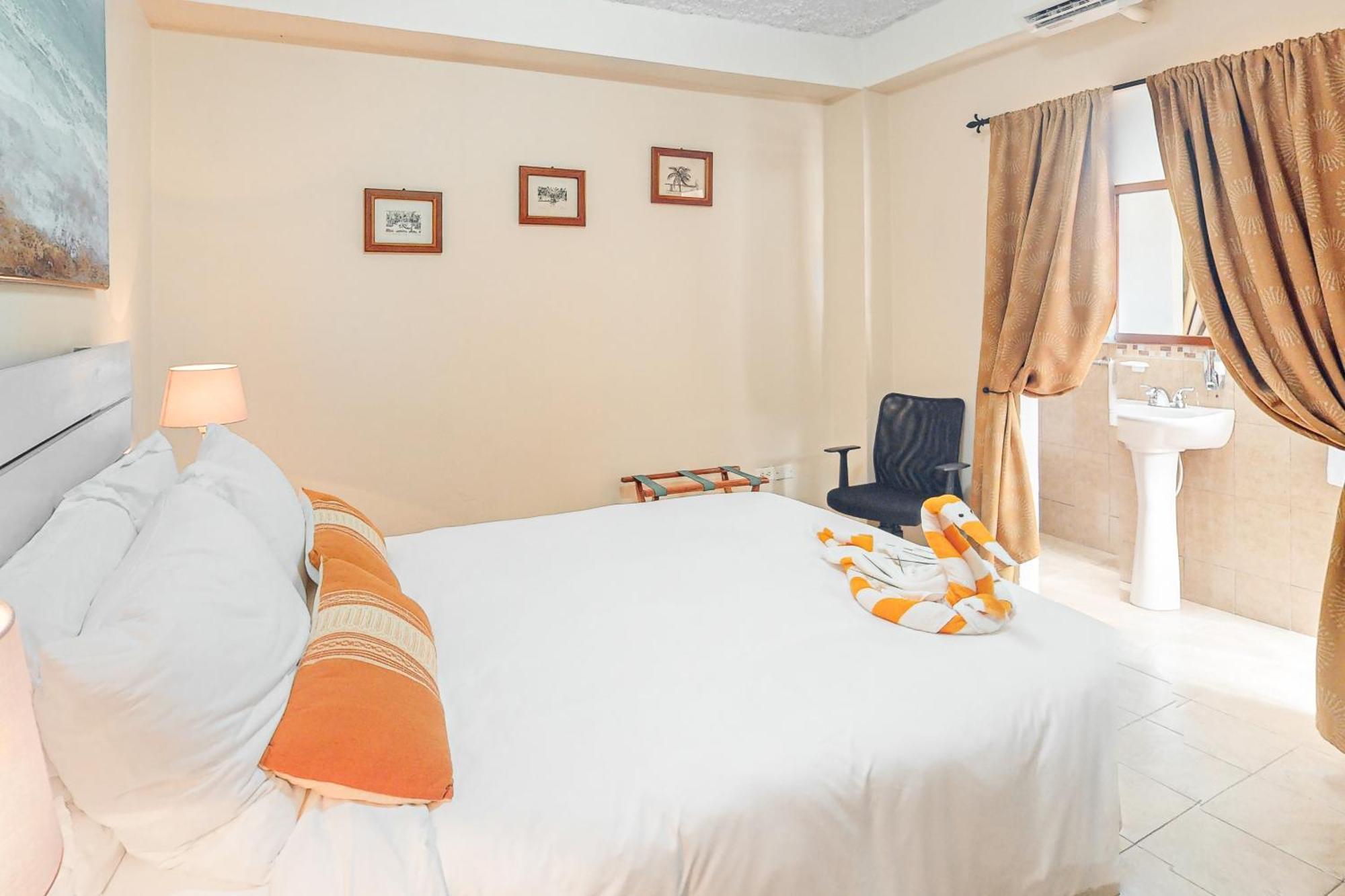 Hummingbird Home Suites Сан-Педро Номер фото