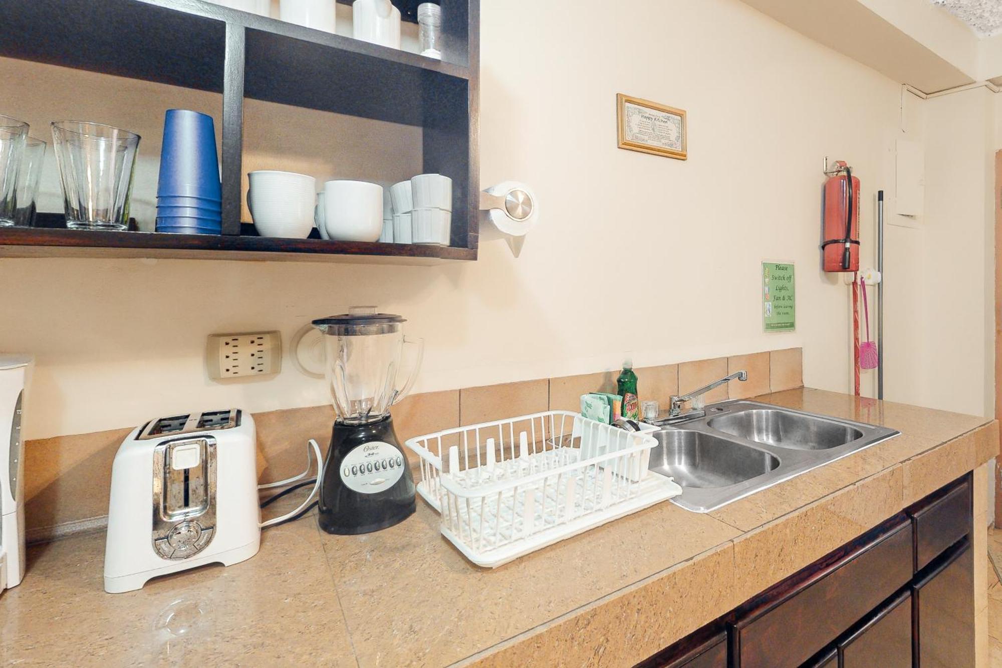 Hummingbird Home Suites Сан-Педро Номер фото